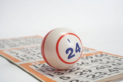  Bingo concept, single ball resting on card